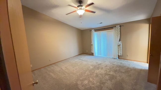 Building Photo - 4bd/3ba HUGE Home w/Hardwood Floors, Russian Fireplace, 2-Car Garage & Fenced Back Yard!