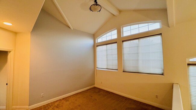 Upstairs family room with gigantic windows and high vaulted ceilings - 2107 Plant Ave