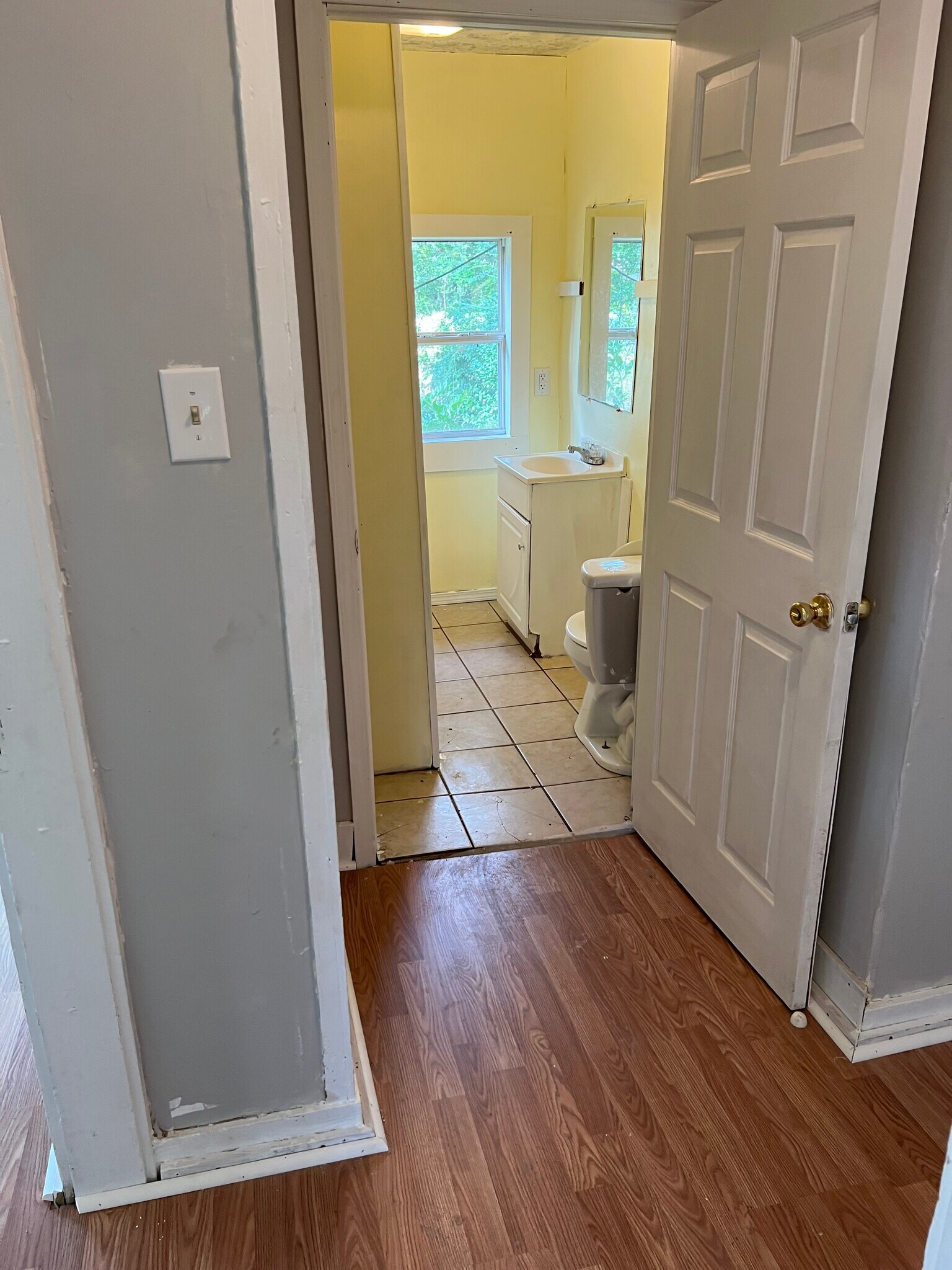 Hallway view into Bathroom - 607 John D Shaw St