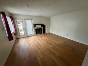 Building Photo - Cozy 1BD Condo in Richardson ISD with Fireplace & Amenities