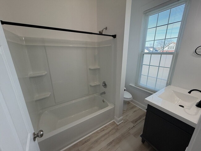 Building Photo - Newly Renovated 2-Bedroom with Soaring Ceilings & Bonus Reading Nook