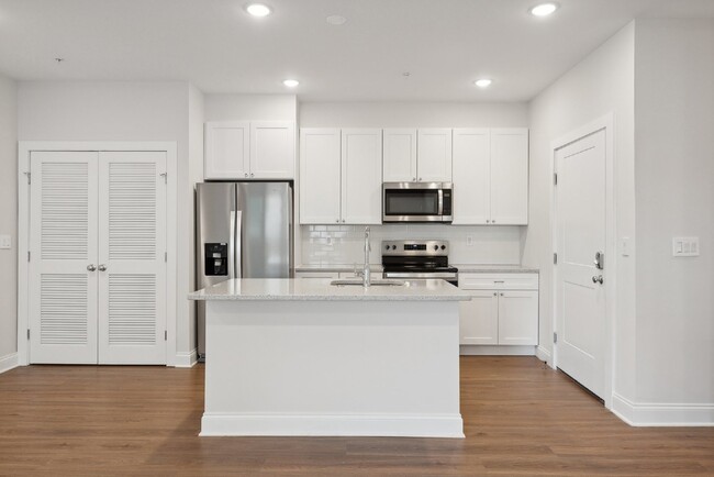 Building Photo - "NEW CONSTRUCTION Urban Living: Spacious 4...