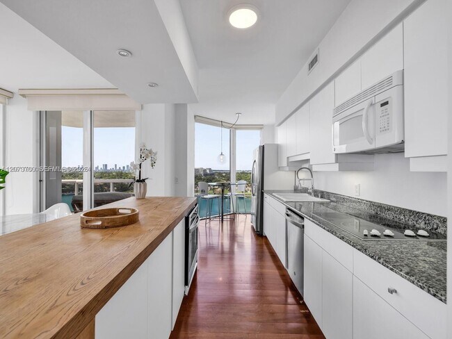 Building Photo - 4779 Collins Ave