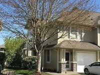 Building Photo - Light & Bright End Unit Condo!