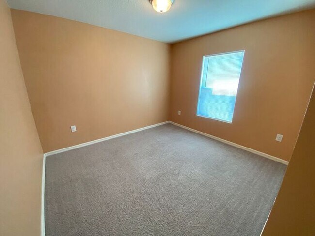 Building Photo - Four Bedroom / Three Bath Home