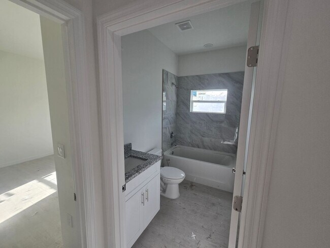 Building Photo - BRAND NEW CONSTRUCTION-LARGE CUSTOM 3/2/2 ...