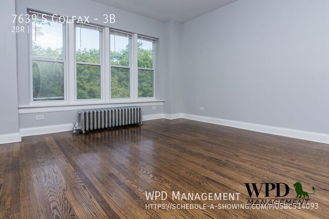 Building Photo - 7639 S Colfax-3B