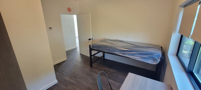 Building Photo - Entirely NEW Building, NEW Appliances - FU...