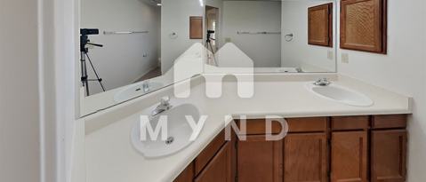 Building Photo - 8690 N Moison Dr
