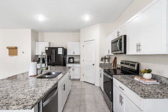 Building Photo - 9520 W Albeniz Pl