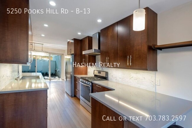 Building Photo - 5250 Pooks Hill Rd