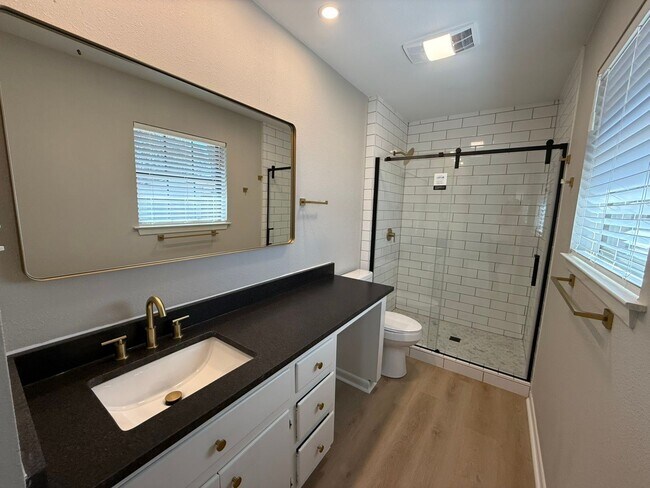 Building Photo - Available-Remodeled 3/2 with 4-Car Garage!