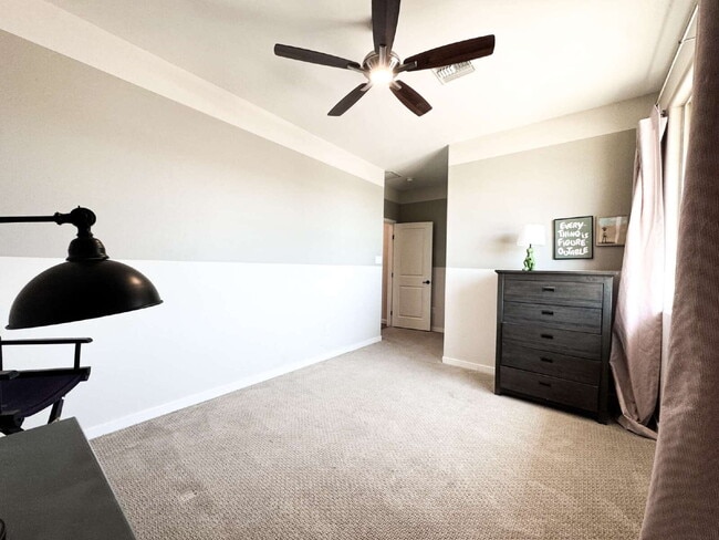 Building Photo - "Spacious 4-Bedroom, 2.5-Bathroom SOLAR Home in Mesa del Sol!"