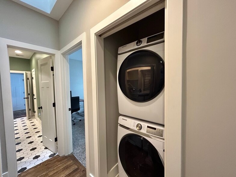 Laundry storage closet and stacked washer/dryer - 405 E 32nd Ave