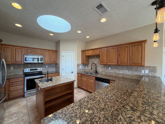 Building Photo - 4 Bedroom Single Story Custom Home Available In Rio Rancho Near Unser Blvd SE & Westside Blvd SE!