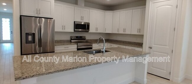 Building Photo - 3855 SE 138th St
