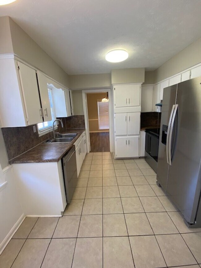 Building Photo - A Quiet Location, $200 Move-N-Special