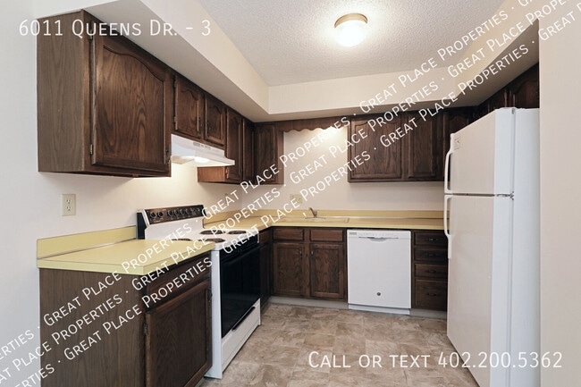 Building Photo - 6011 Queens Dr