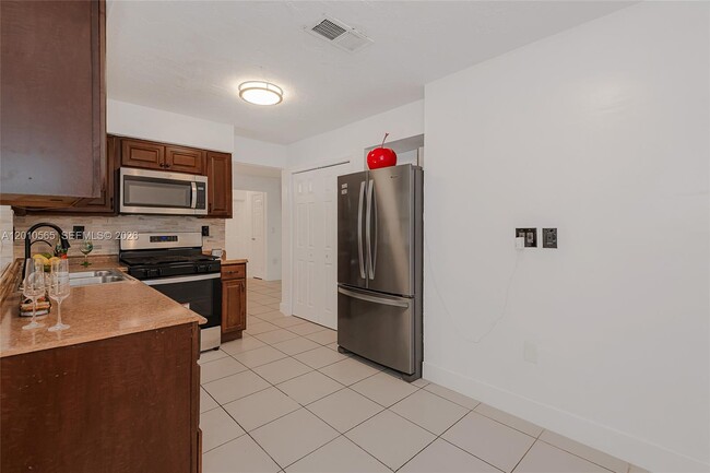 Building Photo - 8690 NW 24th Pl