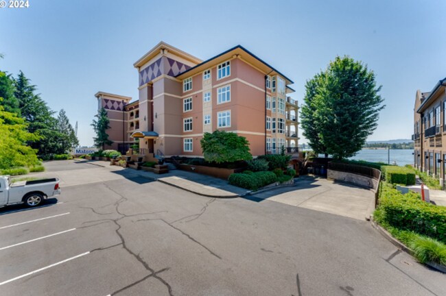 Building Photo - Elegant Riverfront Condo with Panoramic Vi...