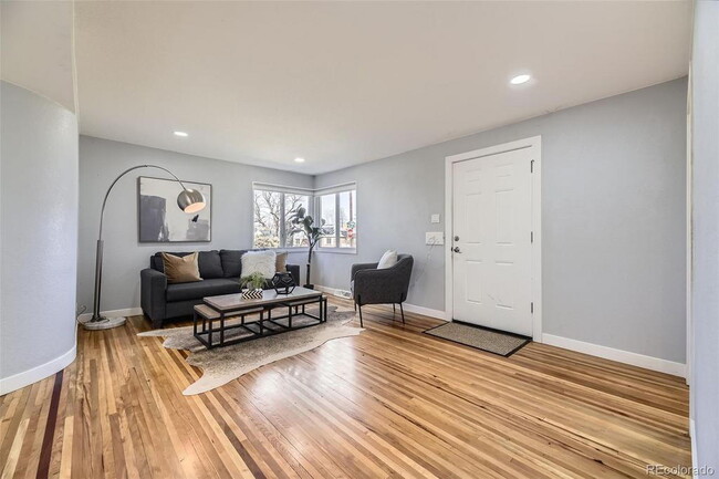 Building Photo - "Charming 3-Bed SFH Denver Gem with Gleaming Hardwood Floors"