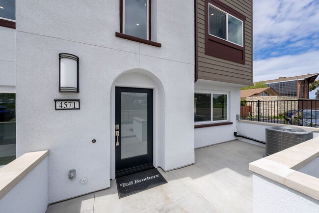Building Photo - Available now! Brand New 4 Bedroom Townhom...