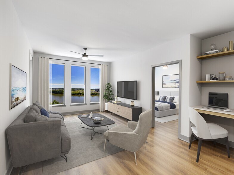 Enjoy effortless work-from-home convenience at Modera Riverview, where select homes feature built-in desks and shelving. - Modera Riverview