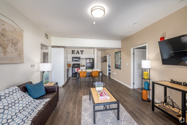 4BR, 4BA - 1,415SF - Kitchen/Living Room - GrandMarc at University Village