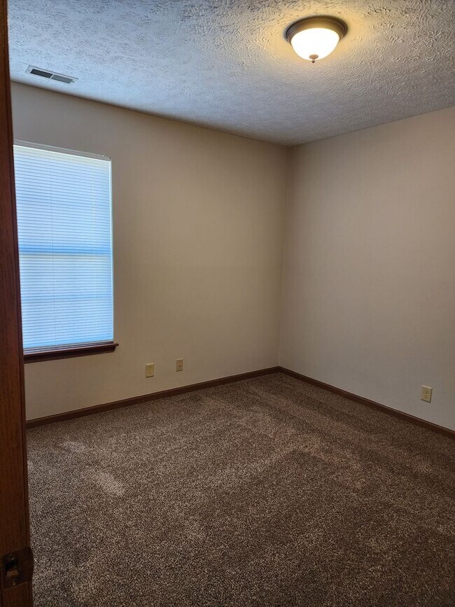 Building Photo - Newly Renovated! 3 Bedroom, 2 Bath, 2 Car ...