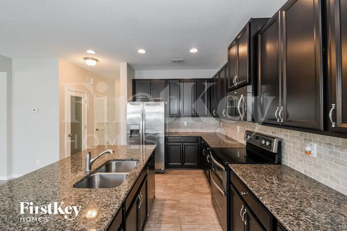 Building Photo - 7031 Azalea Grove Dr