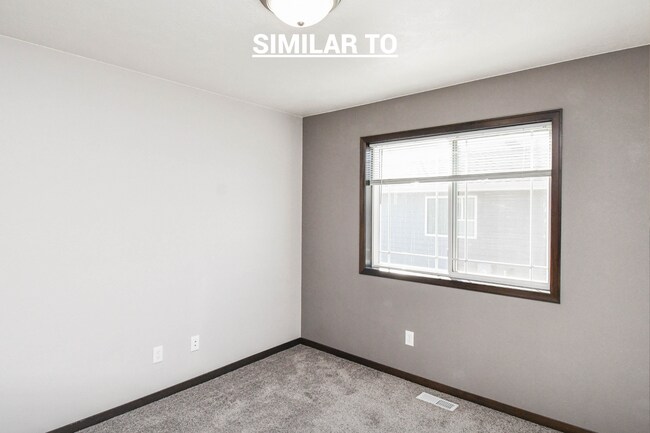 Building Photo - East Sioux Falls 4-Bedroom Townhome – Style, Space & Convenience!