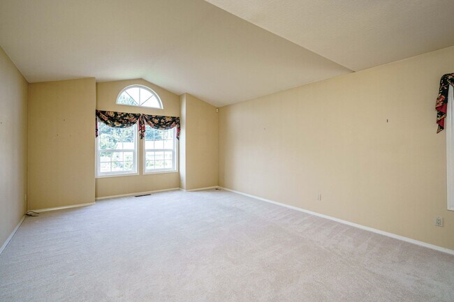 Building Photo - Beautifully Landscaped 1/4 acre with Well Maintained 4 bedroom 2 Bath Home with 3 Car Garage