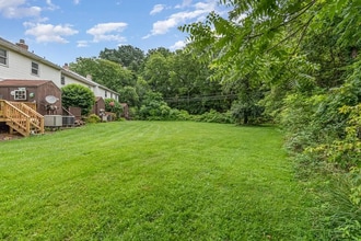 Building Photo - This charming house offers a cozy and comfortable living space.