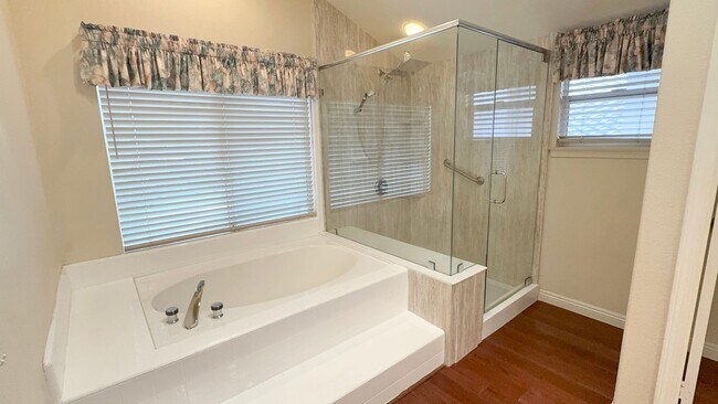 Building Photo - $500 OFF FIRST MONTH! Stunning 4 Bed 4 Bat...