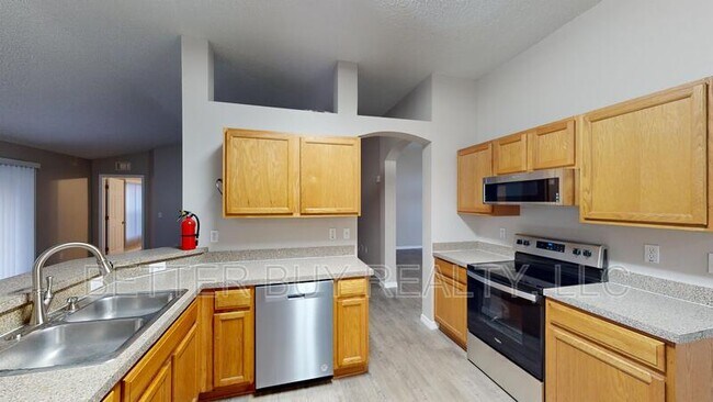 Building Photo - 23 Burning Tree Pl