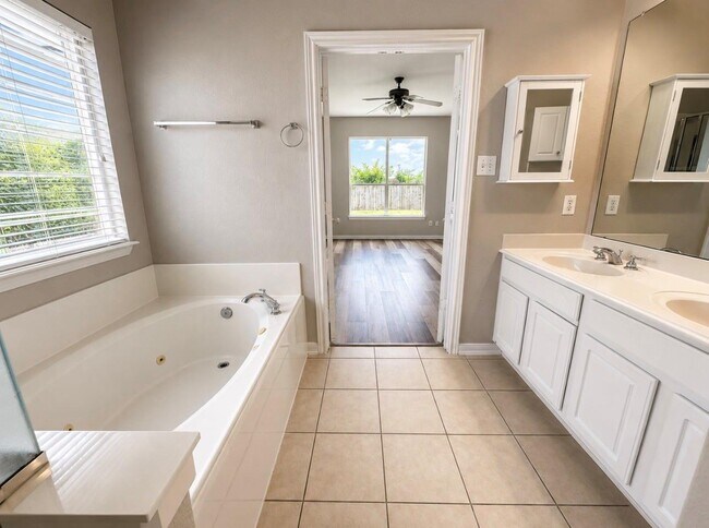 Building Photo - Hollyhock Drive, Stafford, TX 77477 - 4 BR 2 BA single-family home