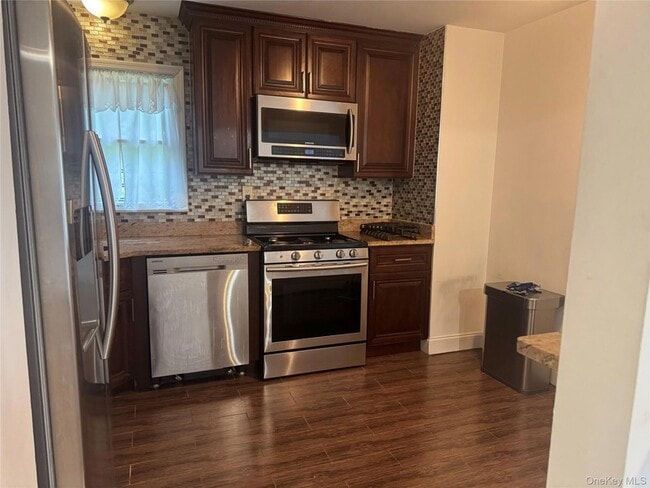 Building Photo - 15649 76th St Unit 2