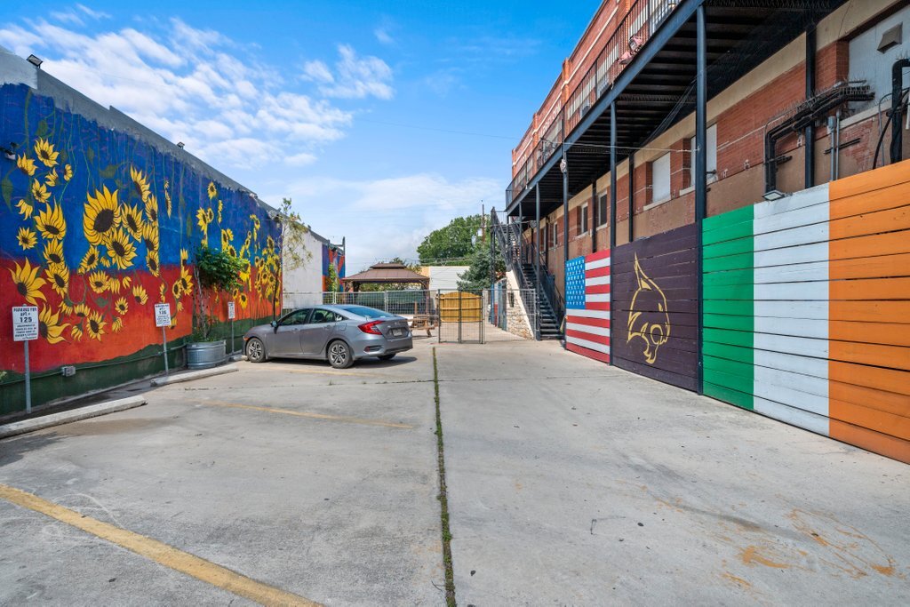 Back are parking used for occasional events as well. - 202 E San Antonio St