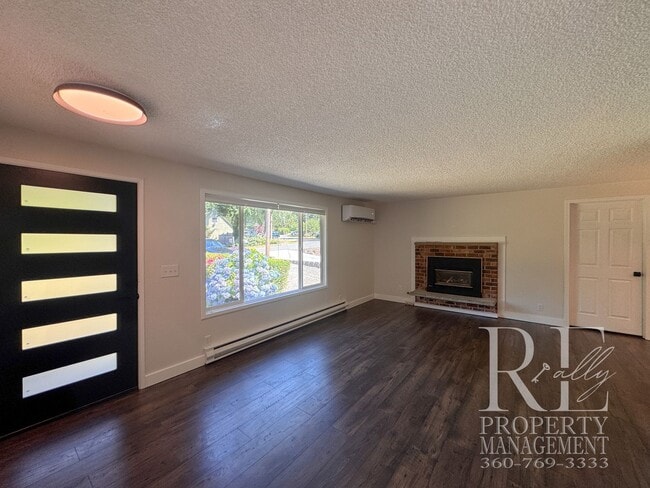 Building Photo - Renovated Poulsbo Home with A/C, & Covered Outdoor Living
