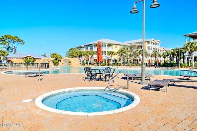 Building Photo - "Spacious 2-Bed Condo with 2.5 Baths on Fr...