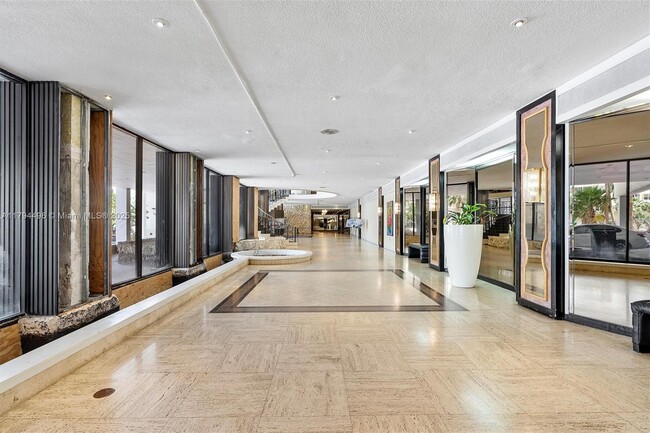 Building Photo - 5555 Collins Ave