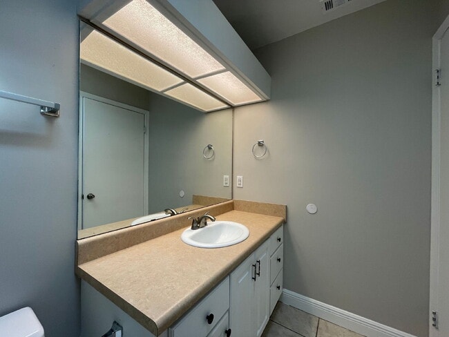 Building Photo - "Charming 3-Bed Oasis with 2 Baths in Prime Panama City Beach Location – 1,423 Sq. Ft. of Serene ...