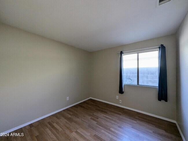 Building Photo - 7059 W Gardenia Ave