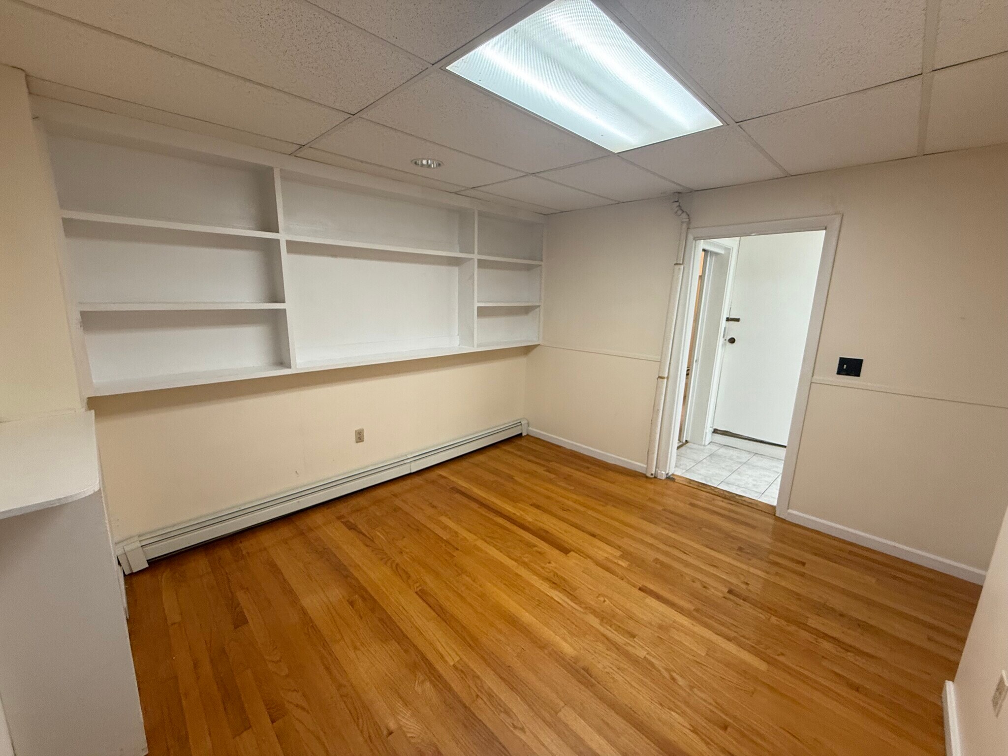 Living room with bookshelf - 39 Newtonville Ave
