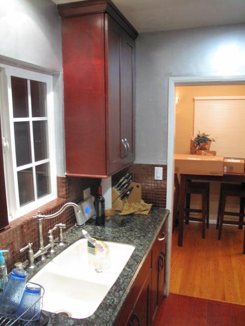 Just another view of kitchen with dining area beyond. - 1857 Pandora Ave