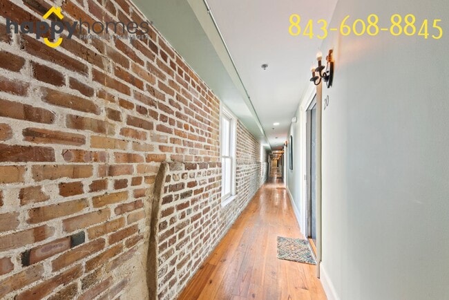 Building Photo - Charming 2/1 loft-style condo in the heart of Historic Downtown Charleston!