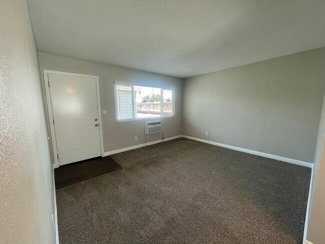 One Bedroom - Living Room - Evart Apartments