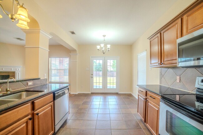 Building Photo - "Spacious 4-Bedroom Retreat with 2.5 Baths...