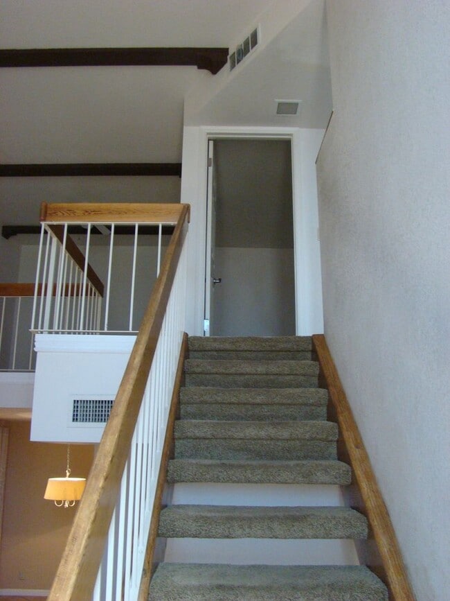 Building Photo - Spacious 3 bedroom, 3 bath, condo with a l...