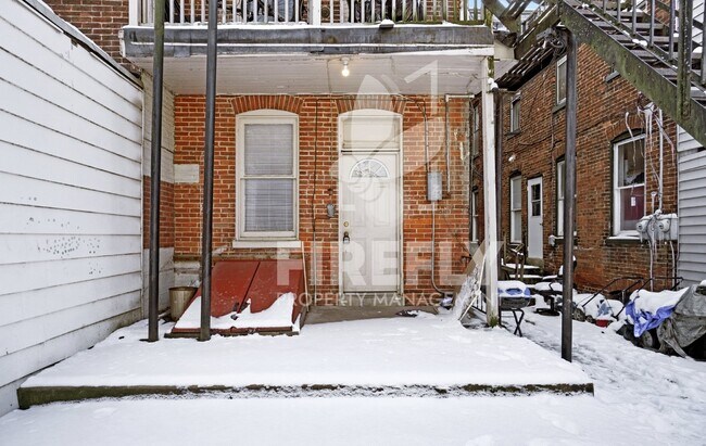 Building Photo - Welcome to your new home—a cozy and stylish spot in a friendly multi-family building right here i...